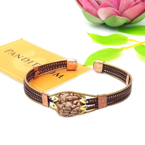 3 Mukhi Copper Rudraksha Bracelet with Brass Accents — main bead view showing mukhi (faces)
