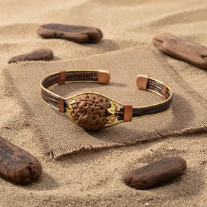 4 Mukhi Copper Rudraksha Bracelet with Brass Accents — close-up macro showing surface texture and natural lines