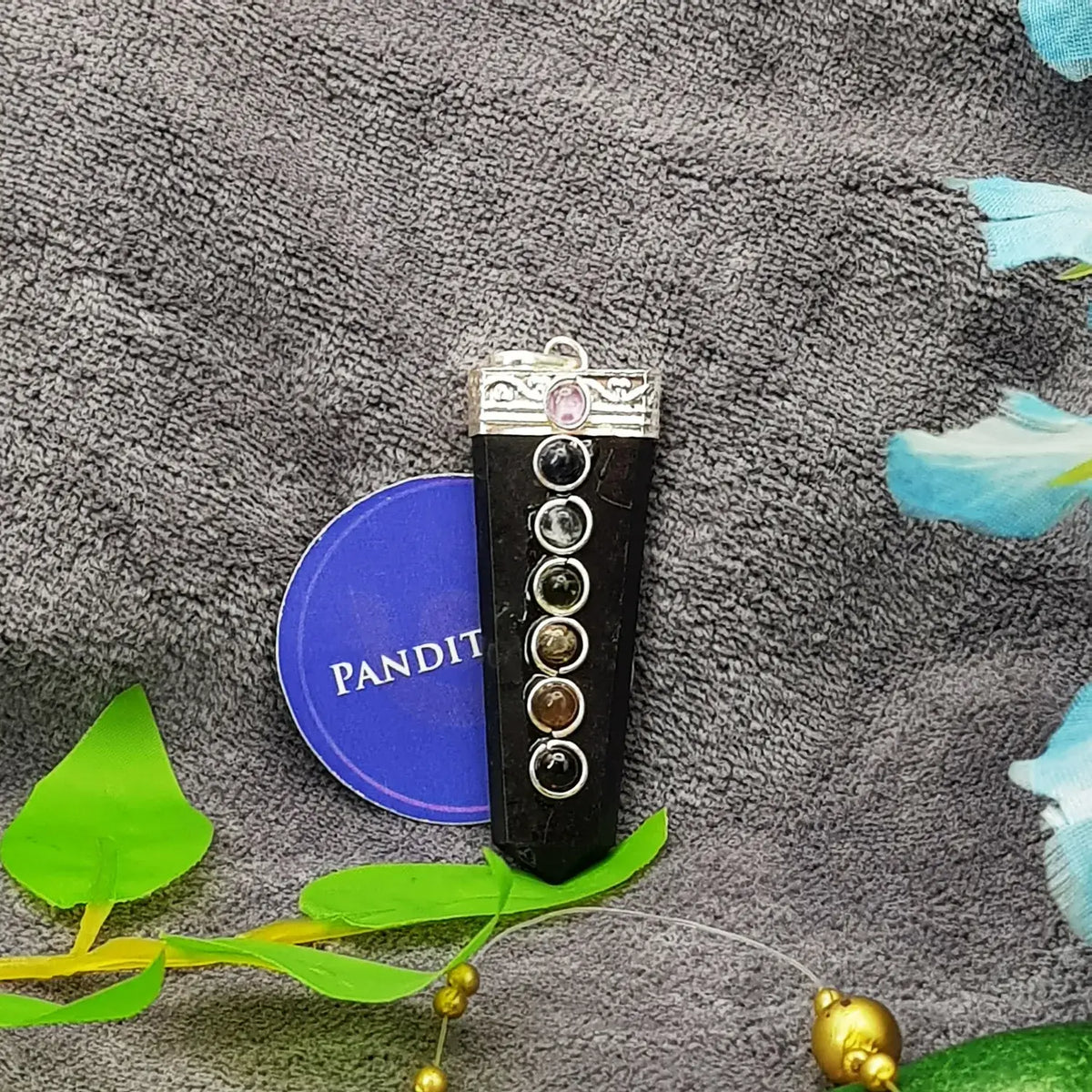 Black Tourmaline 7 Chakra Pencil Pendant — close-up showing stone setting and detail