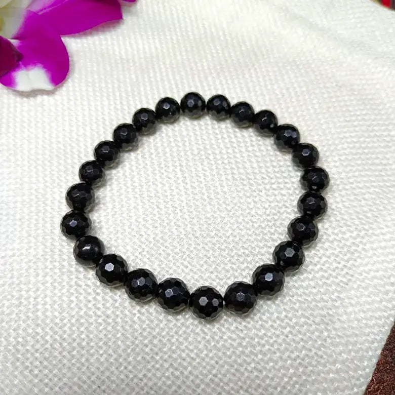 Black Tourmaline Diamond Cut Bracelet — close-up of Black Tourmaline Diamond Cut stones revealing natural patterns