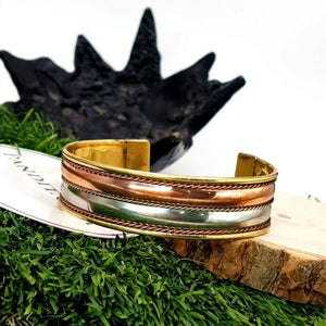 Copper and Brass Bracelet with White Metal — front view of bracelet showing beads and stringing