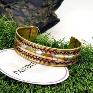 Copper and Brass Bracelet with White Metal — front view of bracelet showing beads and stringing