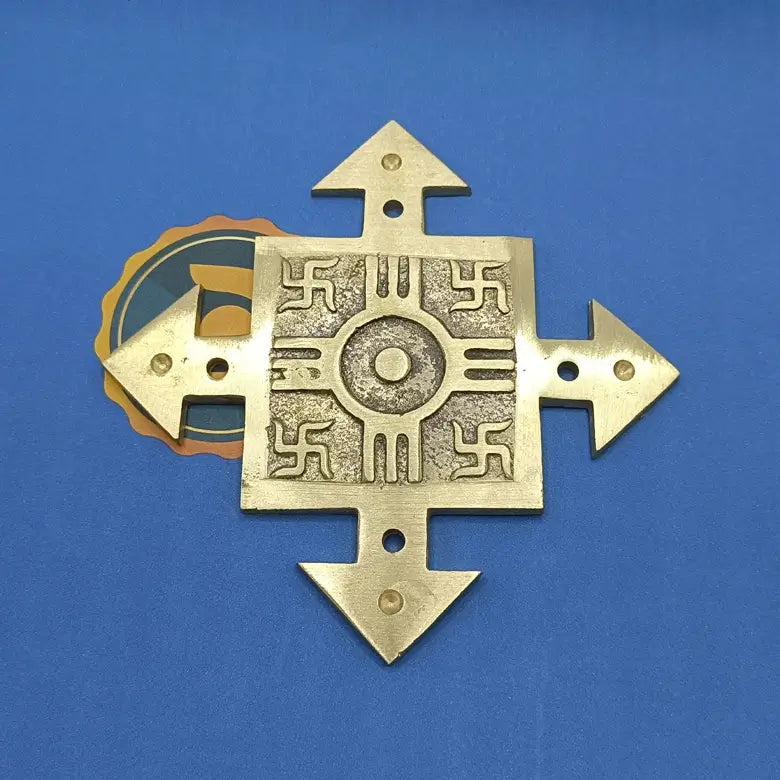 Four Direction Arrow with Swastik Plate — close-up detail showing texture and craftsmanship