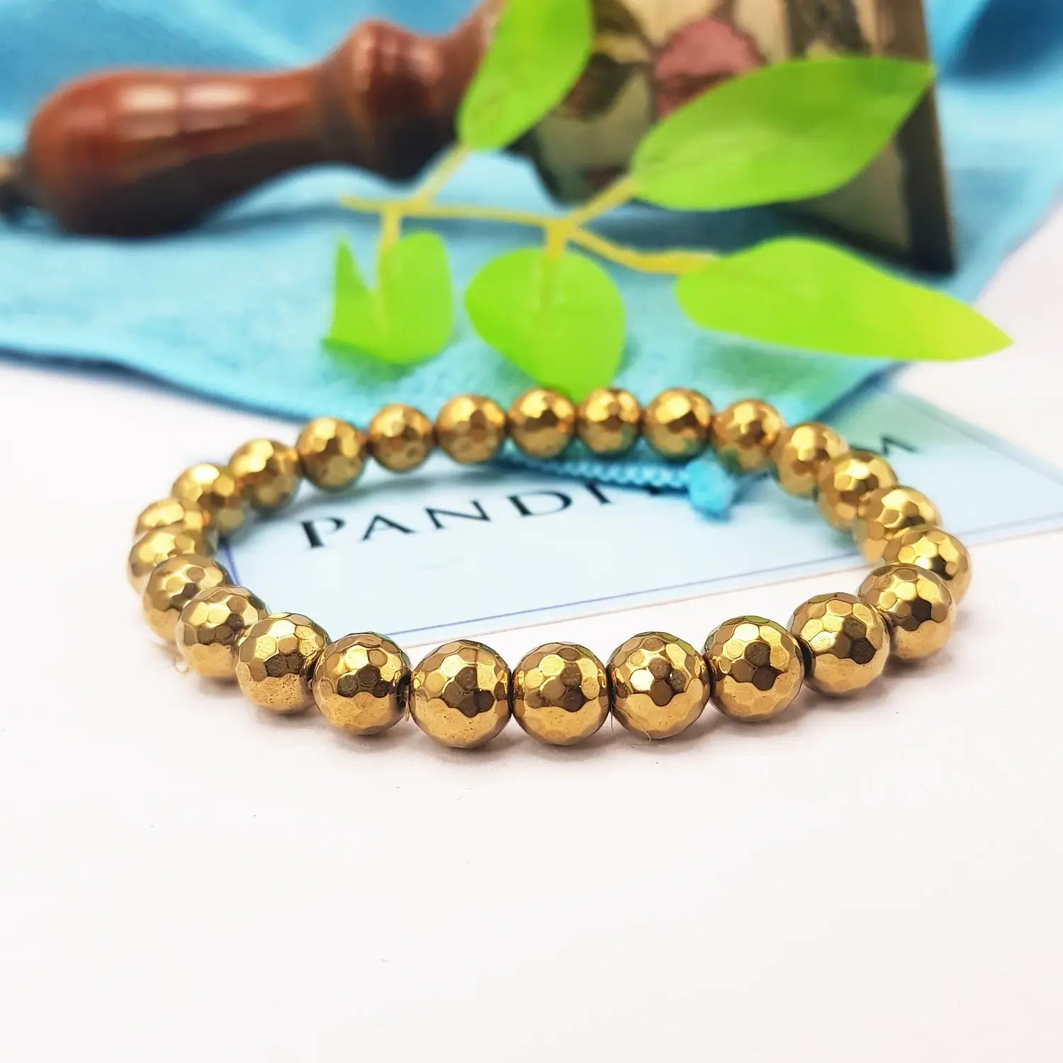 Golden Hematite Diamond Cut Bracelet — front view of bracelet showing beads and stringing