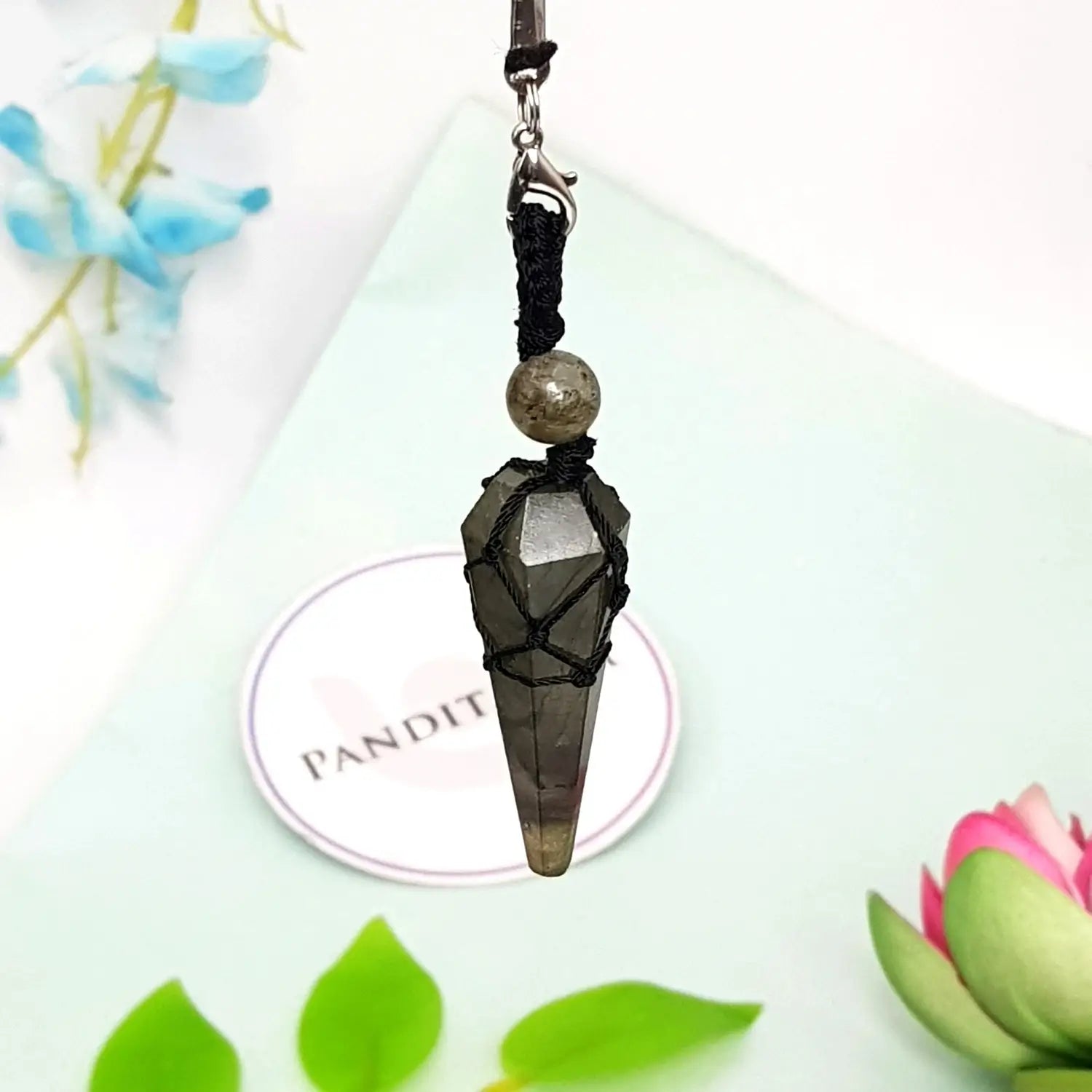 Labradorite Dowsing Pendulum — close-up of crystal point and faceting