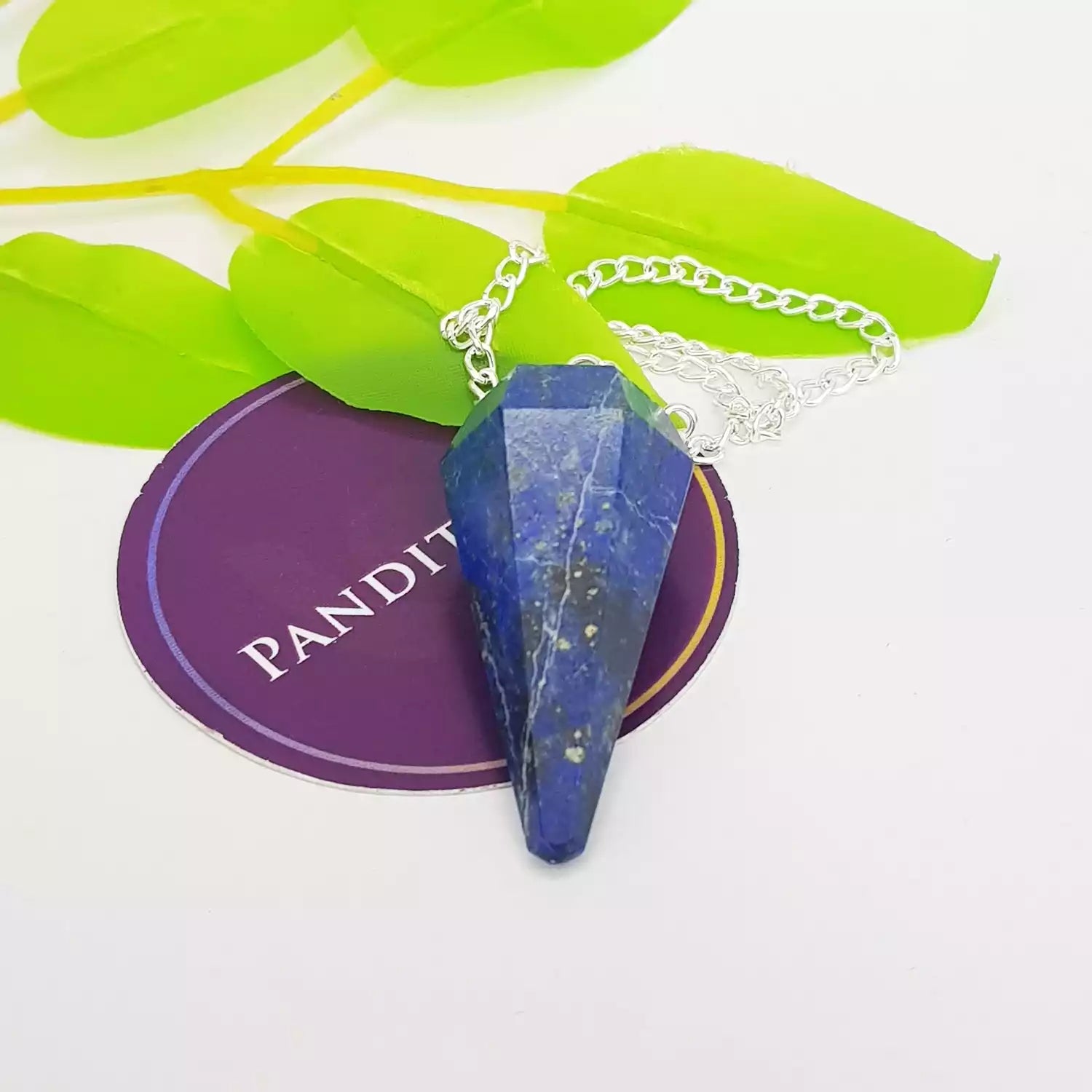 Lapis Lazuli Dowsing Pendulum — close-up of crystal point and faceting