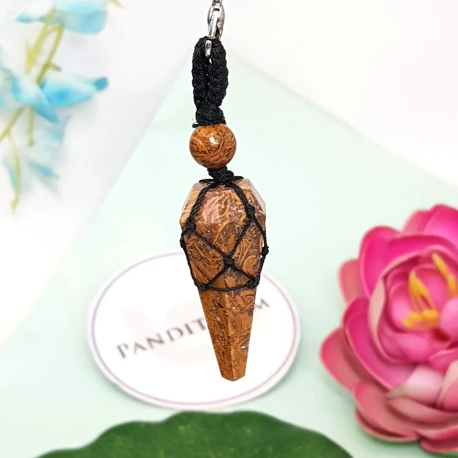 Mariam Jasper Dowsing Pendulum — close-up of crystal point and faceting