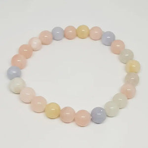 Morganite Bracelet — comparison size reference next to coin
