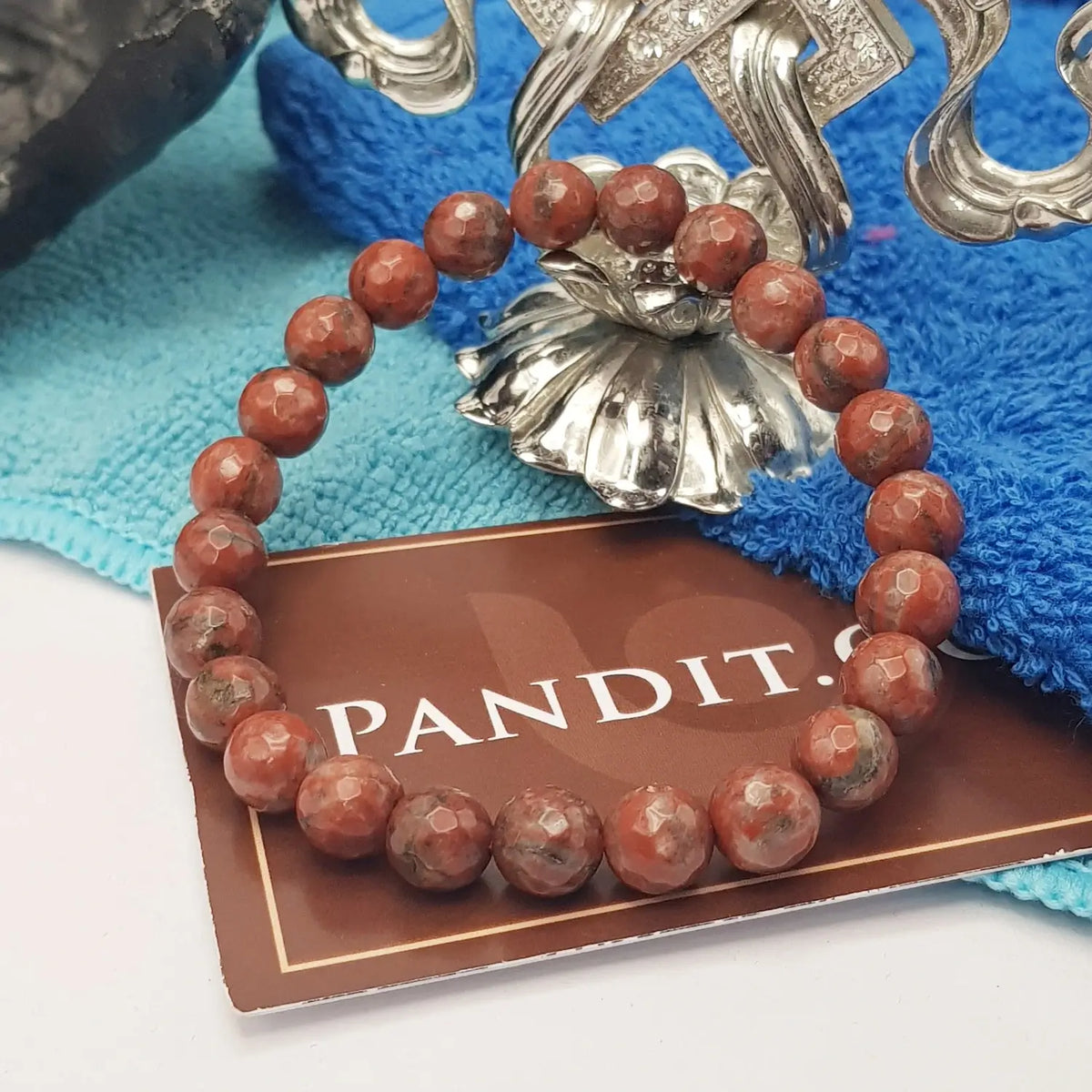 Red Jasper Diamond Cut Bracelet — front view of bracelet showing beads and stringing