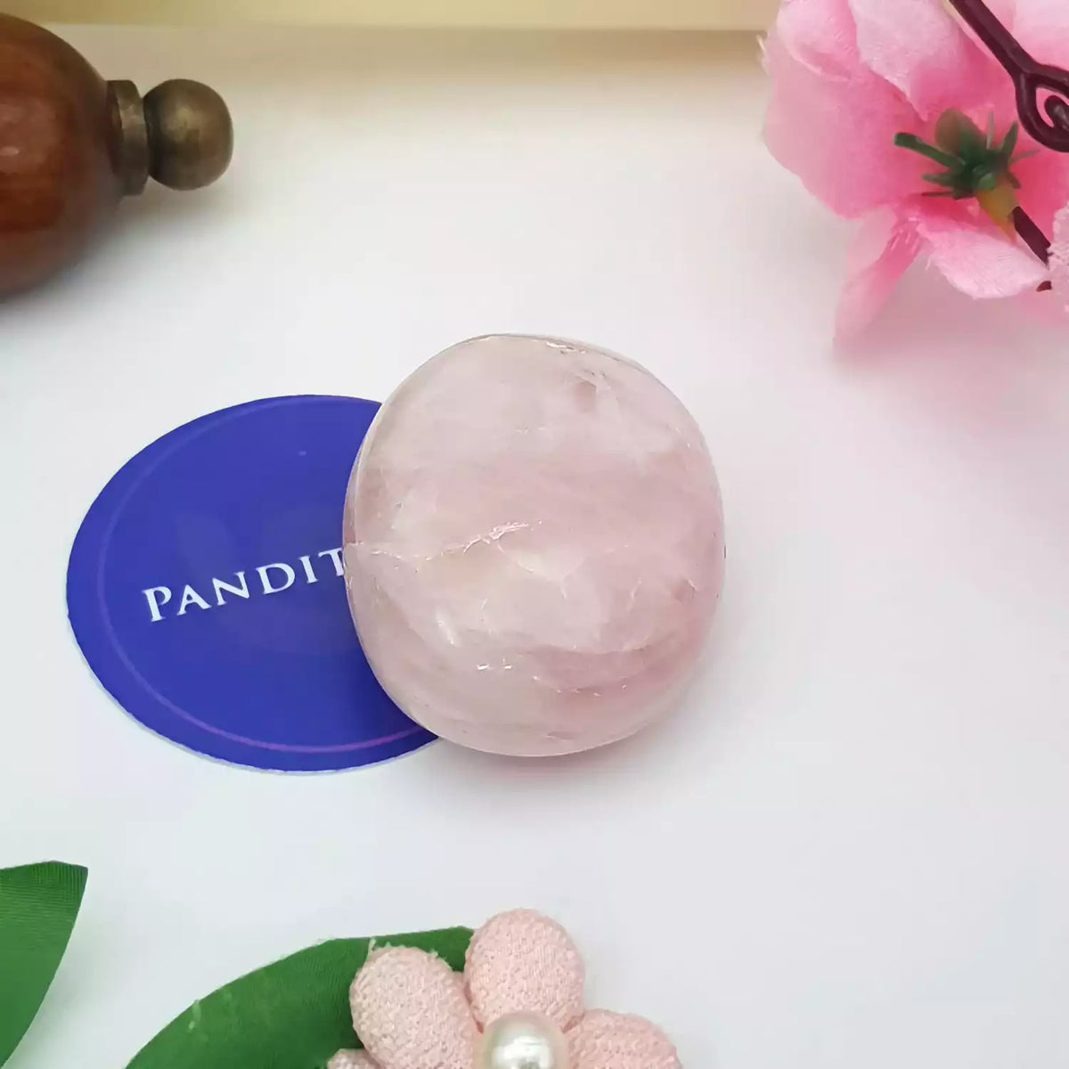 Rose Quartz Healing Crystal Palm Stone — close-up detail showing texture and craftsmanship