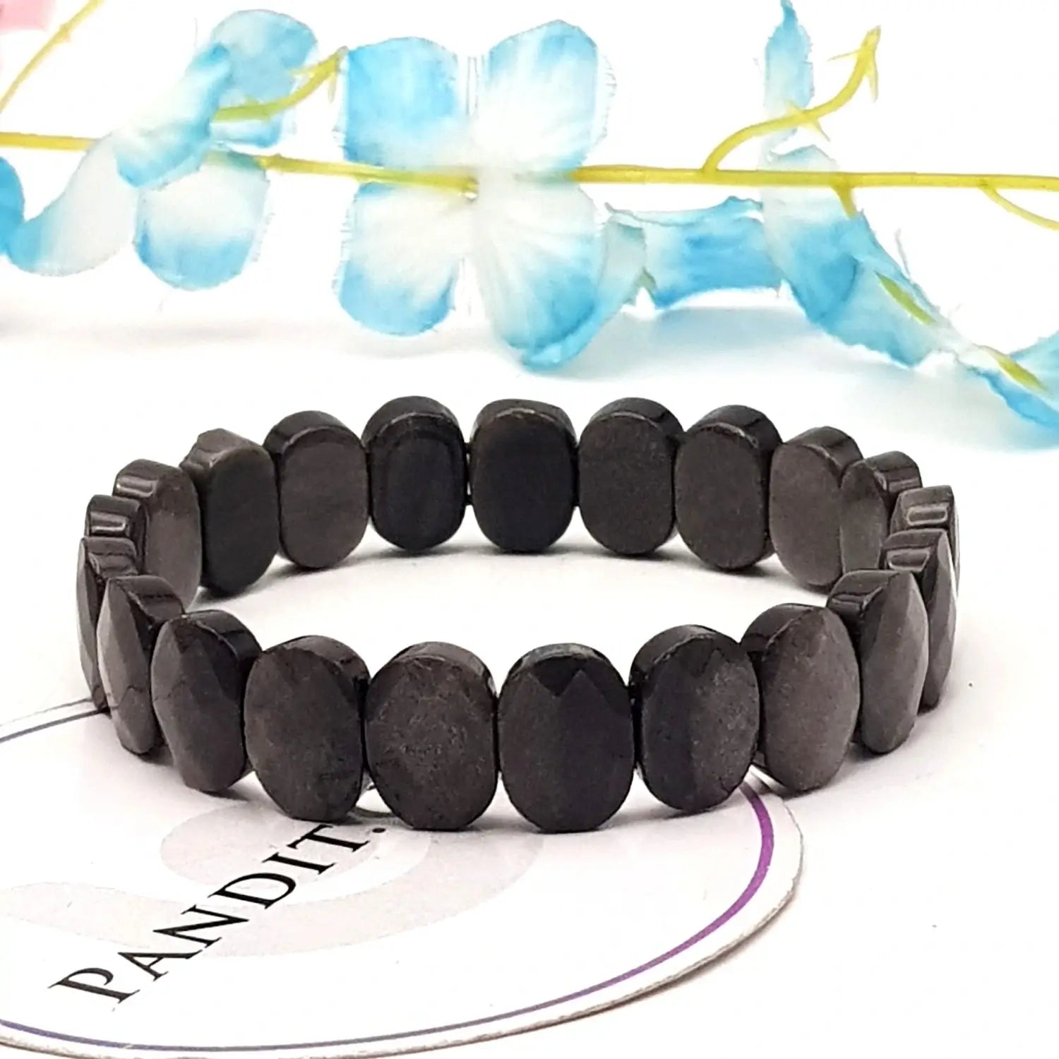 Silver Obsidian Oval Faceted Bracelet — close-up of Silver Obsidian Oval Faceted stones revealing natural patterns
