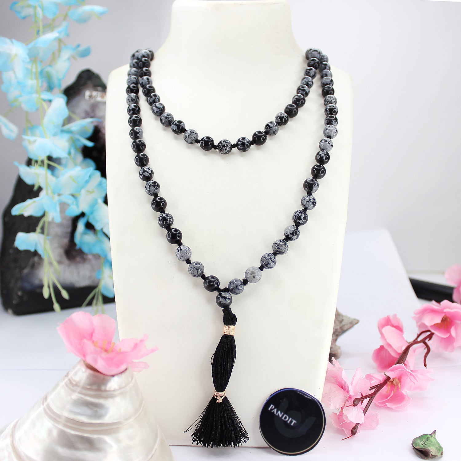 Snowflake Obsidian Mala — close-up of guru bead and meru detail