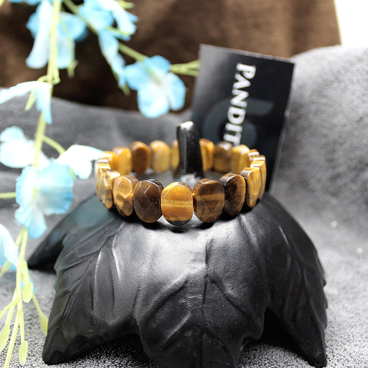 Tiger Eye Agate Oval Faceted Bracelet — front view of bracelet showing beads and stringing