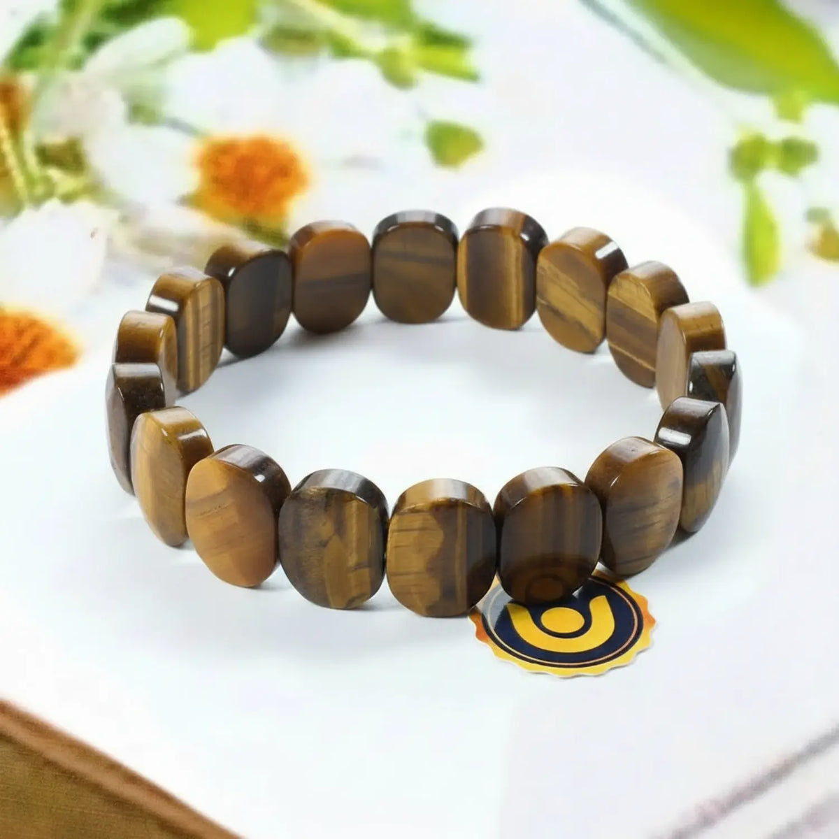 Tiger Eye Agate Oval Faceted Bracelet — close-up of Tiger Eye Agate Oval Faceted stones revealing natural patterns
