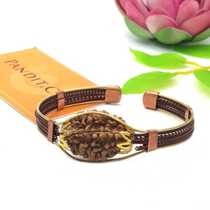 2 Mukhi Copper Rudraksha Bracelet with Brass Accents — main bead view showing mukhi (faces)