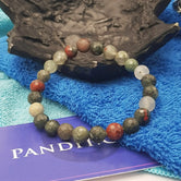 African Bloodstone Diamond Cut Bracelet — front view of bracelet showing beads and stringing