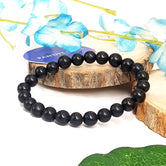 Black Hakik Bracelet — front view of bracelet showing beads and stringing