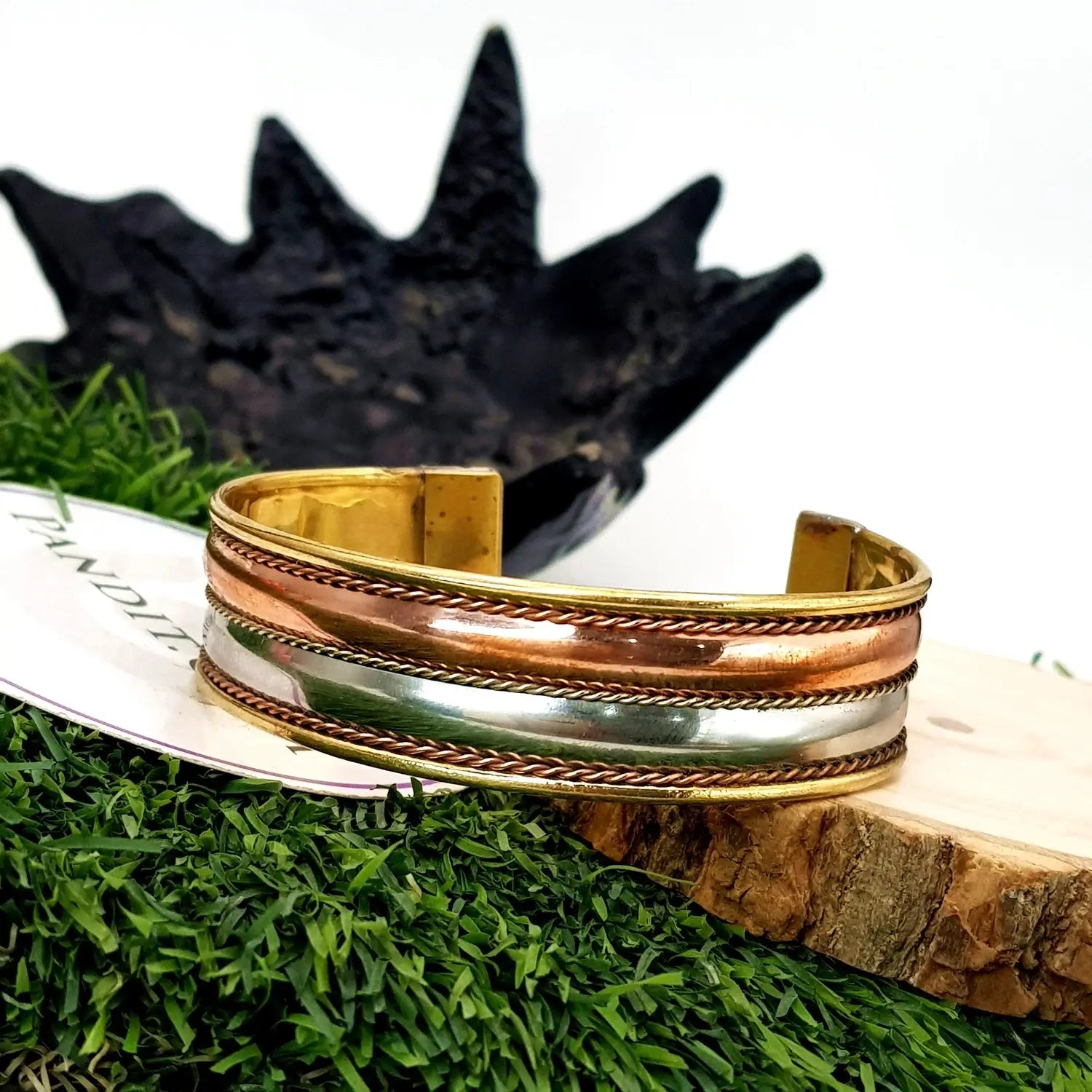 Copper and Brass Bracelet with White Metal — front view of bracelet showing beads and stringing