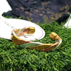 Copper and Brass Bracelet with White Metal — comparison size reference next to coin