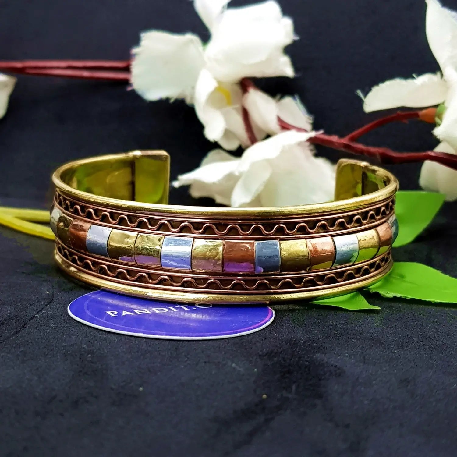 Copper and Brass Bracelet with White Metal — bracelet worn on wrist demonstration