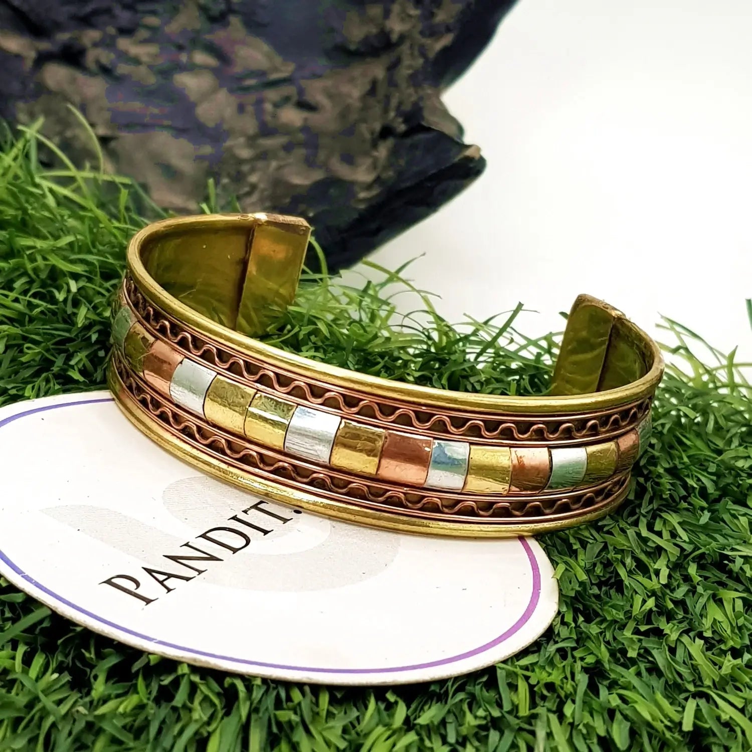Copper and Brass Bracelet with White Metal — front view of bracelet showing beads and stringing