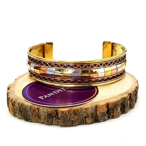 Copper and Brass Bracelet with White Metal — close-up of Copper and Brass Bracelet with White Metal stones revealing natural patterns