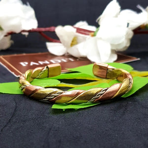 Copper and Brass Bracelet with White Metal — clasp and elastic threading detail